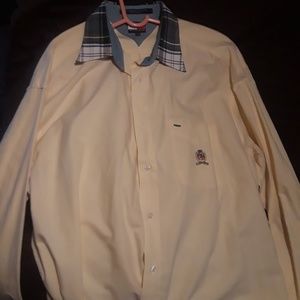 A large Tommy Hilfiger button down yellow shirt